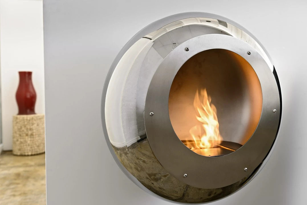 Cocoon Vellum – Acier poli : une cheminée bioéthanol éclatante, alliance parfaite de modernité et de raffinement.